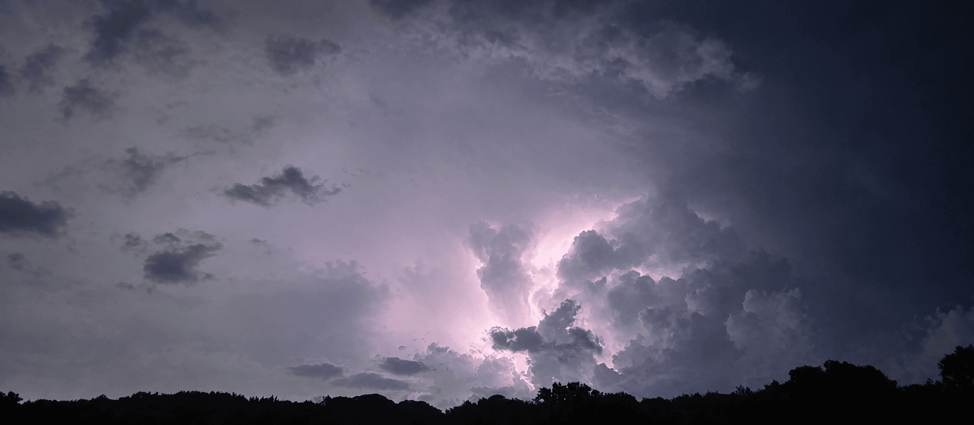 Lightning illuminating a dramatic night sky